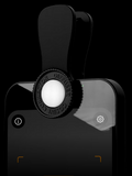 Close-up of the white light meter diffuser and cosine corrector clipped to the top of a phone
