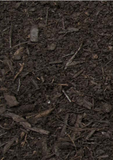 Close-up of dark Lane Ocean Rich Compost with small wood pieces.