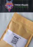 Gold pouch of KiS Bloom Booster included with Westport Blend soil, on a Twin Peaks Cannabis card.
