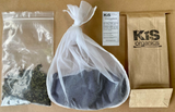 Compost tea kit contents: bag of dry ingredients, mesh brew bag and KiS Organics paper packet