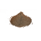 Pile of KiS Mineral Mix, a dark brown blend of rock dust, phosphate and oyster shell flour.