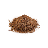 Pile of reddish-brown organic crab and crustacean meal on a white background