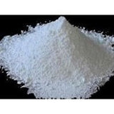 Pile of white wollastonite calcium silicate powder